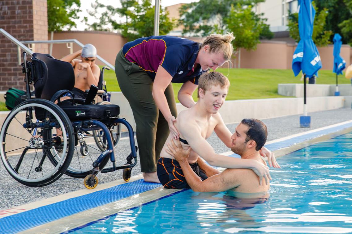 A young male ParaSTART participant preparing for a swim training session at UQ.